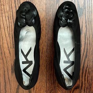 Women’s Anne Klein sport black wedge shoes w floral front. Size 7. Fabric upper.